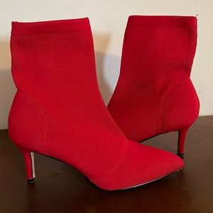 Catherine Malandrino heeled rib knit booties.